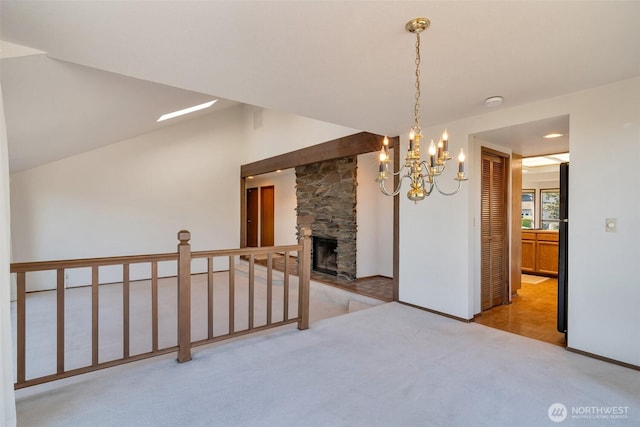 1823 19th Dr, Mukilteo, WA 98275 - carpeted empty room featuring a fireplace and a chandelier