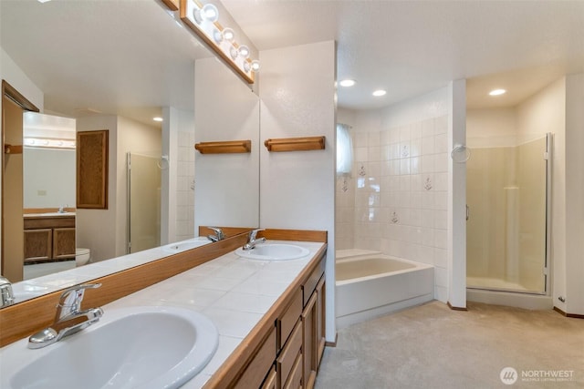 1823 19th Dr, Mukilteo, WA 98275 - bathroom featuring a shower stall, double vanity, a garden tub, and recessed lighting