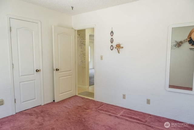 609 W Whitman Dr, College Place, WA 99324 - unfurnished bedroom featuring carpet flooring and a textured ceiling