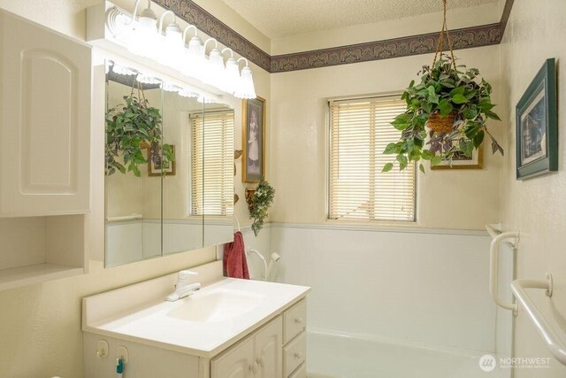 609 W Whitman Dr, College Place, WA 99324 - full bathroom featuring vanity and a garden tub