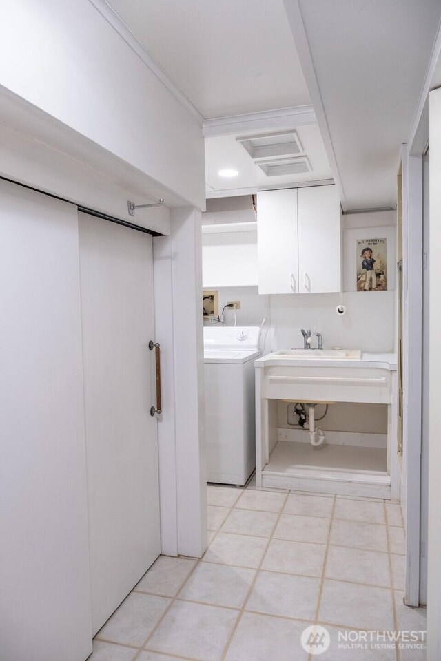 609 W Whitman Dr, College Place, WA 99324 - washroom featuring washer / clothes dryer and light tile patterned floors