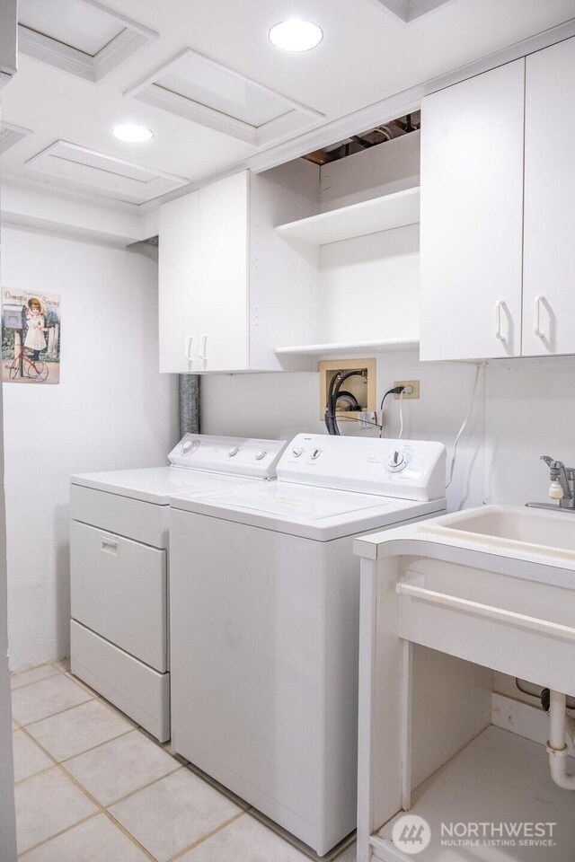 609 W Whitman Dr, College Place, WA 99324 - laundry room with washer and dryer, cabinet space, light tile patterned floors, and recessed lighting