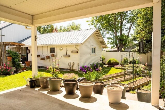 609 W Whitman Dr, College Place, WA 99324 - view of patio / terrace featuring a garden