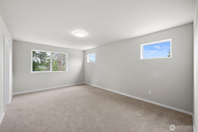 19504 15th Ave E, Spanaway, WA 98387 - unfurnished room featuring light carpet