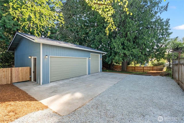 detached garage with fence