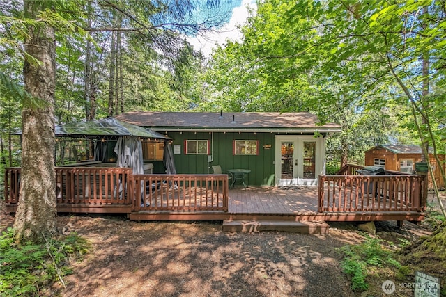 105 Robinwood Pl, Packwood, WA 98361 - back of house with a gazebo, a deck, board and batten siding, and french doors