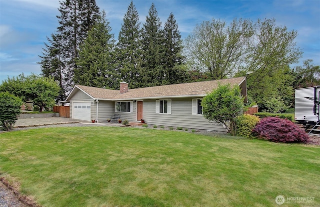 single story home featuring a chimney, a front yard, fence, aphalt driveway, and an attached garage