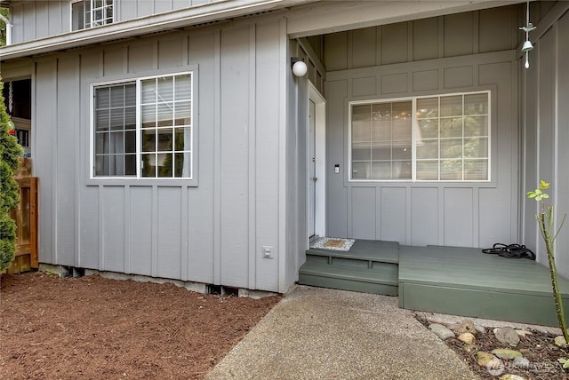 property entrance with board and batten siding
