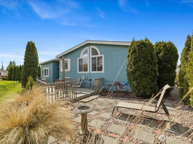 rear view of property with a patio