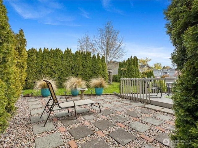 view of patio with a wooden deck