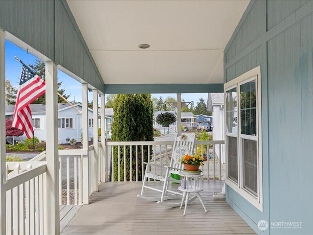 balcony featuring covered porch