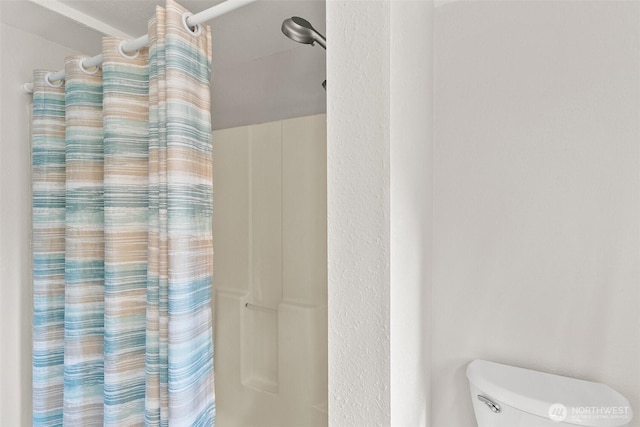 bathroom with a shower with curtain