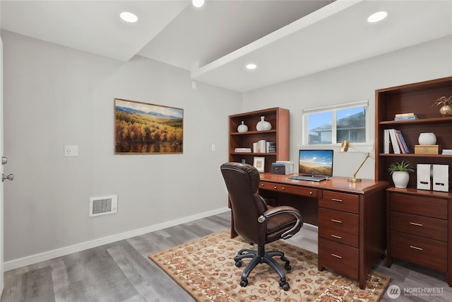 home office with light wood-style floors, baseboards, recessed lighting, and visible vents