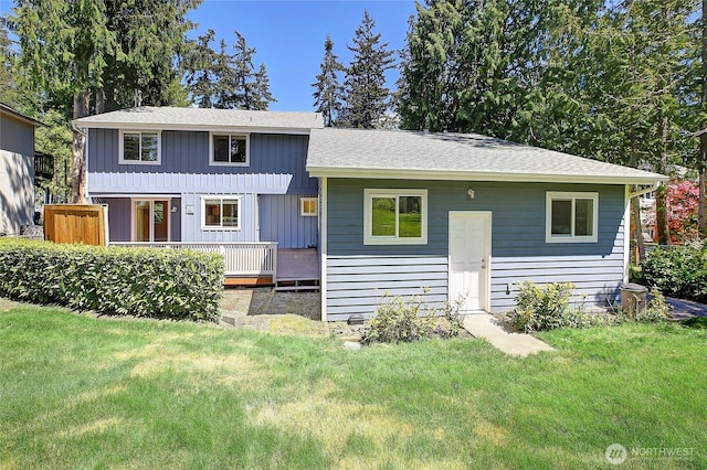 366 Tillicum Way, Camano Island, WA 98282 - rear view of house featuring a yard, roof with shingles, and a wooden deck