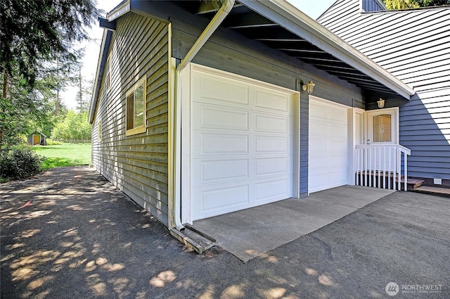 366 Tillicum Way, Camano Island, WA 98282 - garage featuring driveway