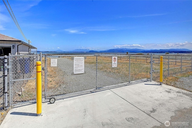 366 Tillicum Way, Camano Island, WA 98282 - view of patio / terrace featuring a mountain view and fence