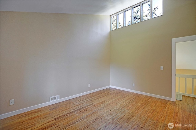 366 Tillicum Way, Camano Island, WA 98282 - spare room featuring light wood finished floors, visible vents, and baseboards