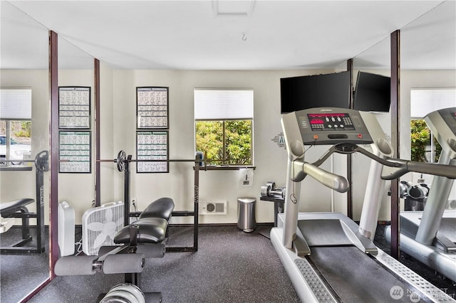 exercise area with baseboards