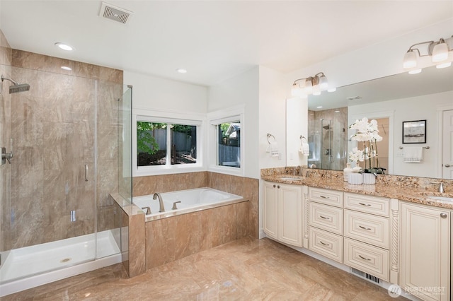 11628 NE 100th St, Kirkland, WA 98033 - full bath with a bath, a shower stall, double vanity, marble finish flooring, and recessed lighting