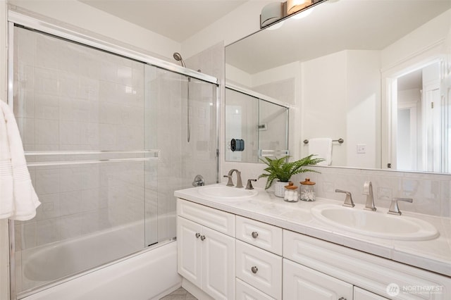 11628 NE 100th St, Kirkland, WA 98033 - bathroom featuring double vanity and enclosed tub / shower combo