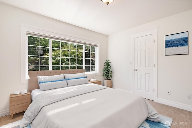 11628 NE 100th St, Kirkland, WA 98033 - bedroom with baseboards and light carpet