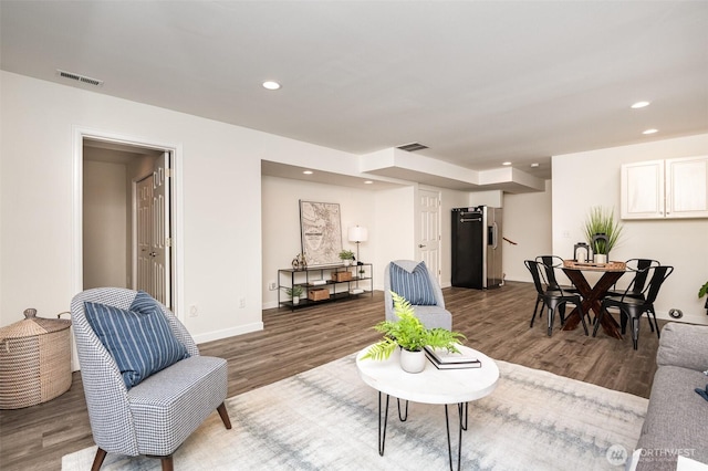 11628 NE 100th St, Kirkland, WA 98033 - living room with wood finished floors, recessed lighting, and baseboards