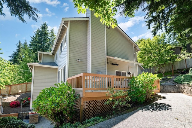 11628 NE 100th St, Kirkland, WA 98033 - rear view of house featuring a deck