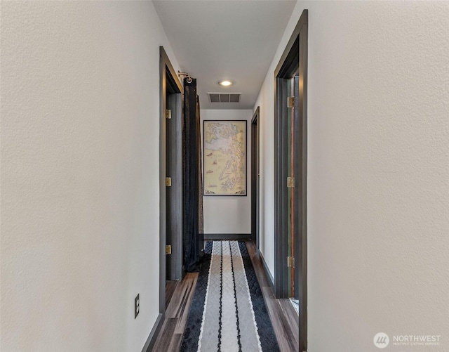 51 Vista Blvd, Port Townsend, WA 98368 - hall featuring dark wood finished floors, baseboards, and visible vents