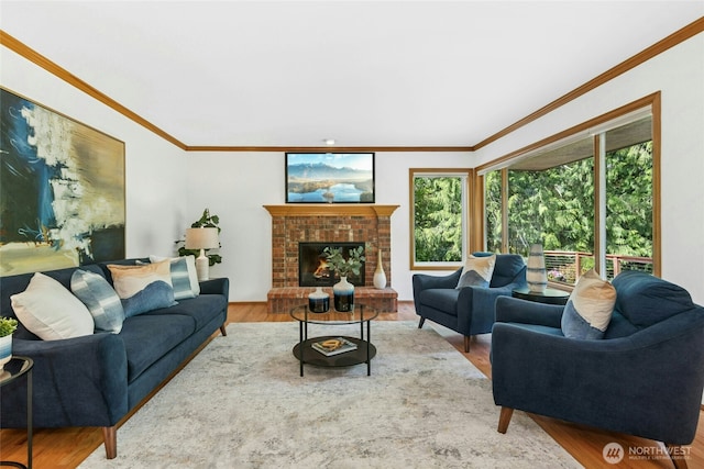 26006 NE 27th Dr, Redmond, WA 98053 - living area featuring ornamental molding, a fireplace, and wood finished floors