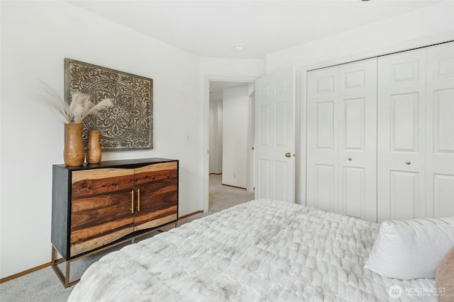 26006 NE 27th Dr, Redmond, WA 98053 - bedroom featuring baseboards, carpet, and a closet