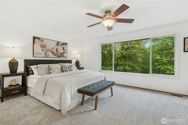 26006 NE 27th Dr, Redmond, WA 98053 - bedroom with a ceiling fan, baseboards, visible vents, and light carpet