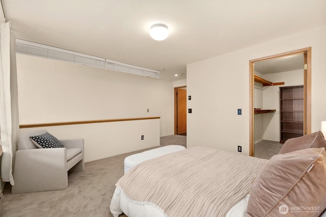 bedroom featuring light carpet