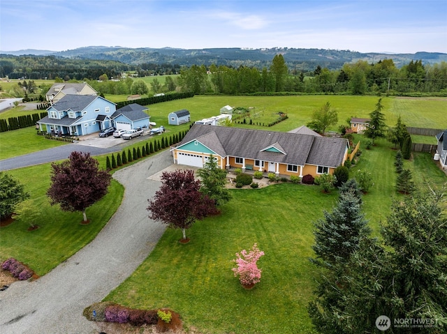 drone / aerial view with a rural view and a mountain view
