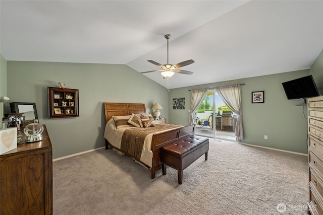 bedroom with baseboards, access to outside, light colored carpet, a ceiling fan, and vaulted ceiling