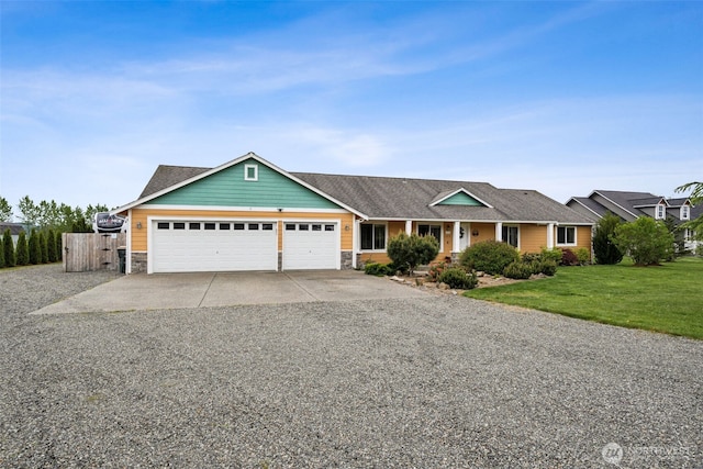 single story home featuring an attached garage, concrete driveway, a front yard, and stone siding