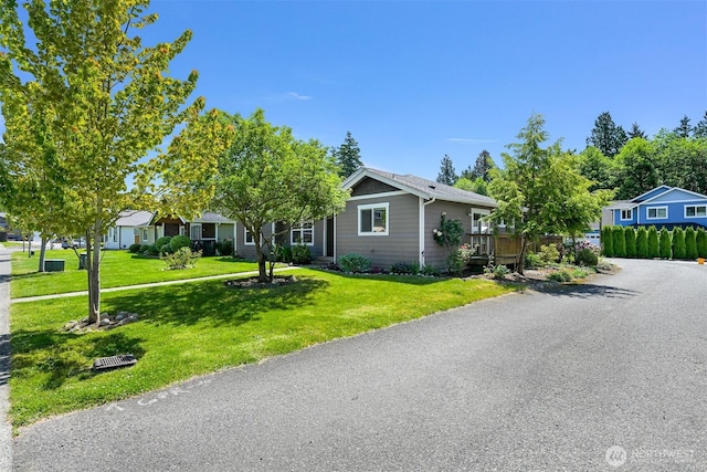 1321 Wilson Ave, Blaine, WA 98230 - view of front of house with a front yard and a wooden deck