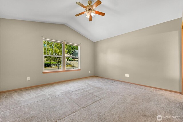 1321 Wilson Ave, Blaine, WA 98230 - spare room with ceiling fan, vaulted ceiling, carpet floors, and baseboards