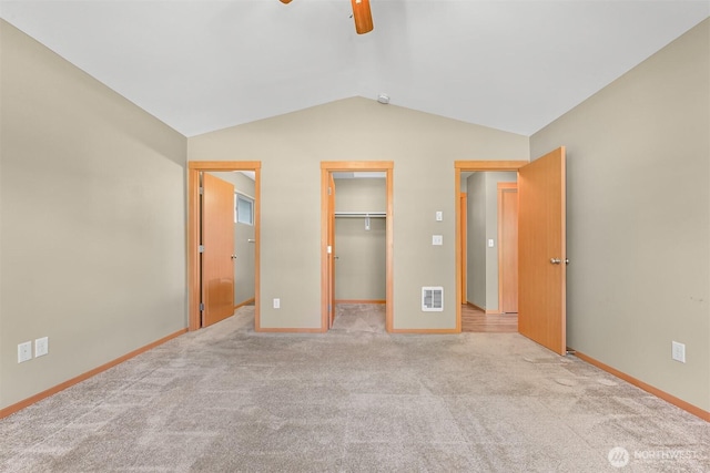 1321 Wilson Ave, Blaine, WA 98230 - unfurnished bedroom featuring lofted ceiling, baseboards, carpet flooring, a spacious closet, and a closet