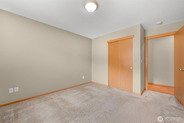 1321 Wilson Ave, Blaine, WA 98230 - unfurnished bedroom with carpet flooring, a closet, and baseboards