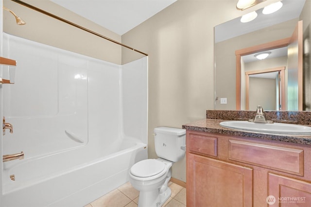 1321 Wilson Ave, Blaine, WA 98230 - full bathroom with toilet, vanity, tile patterned floors, and shower / bathtub combination