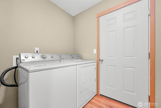 1321 Wilson Ave, Blaine, WA 98230 - laundry area with washing machine and clothes dryer and light wood finished floors