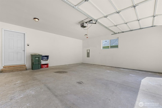 1321 Wilson Ave, Blaine, WA 98230 - garage with electric panel and a garage door opener
