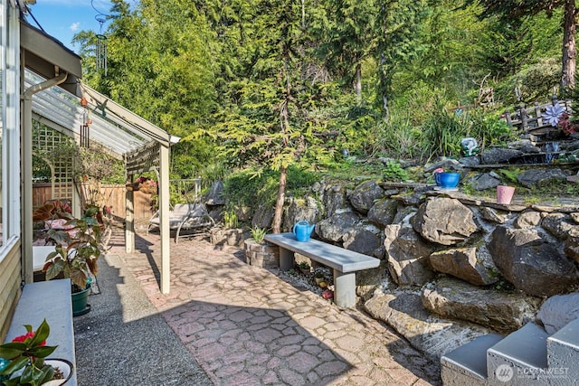 view of patio with fence