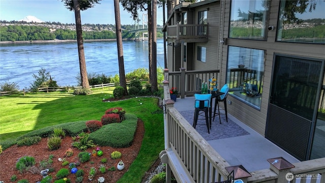 exterior space with a water view