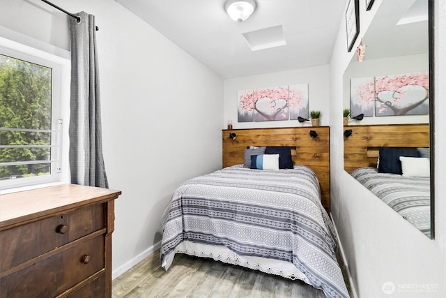 21702 Little Mountain Rd, Mount Vernon, WA 98274 - bedroom with baseboards and light wood finished floors