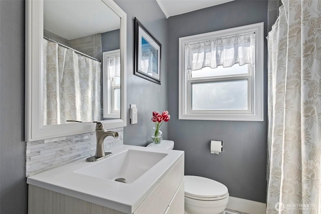 119 N Mckinley St, Burlington, WA 98233 - bathroom featuring toilet, vanity, and baseboards