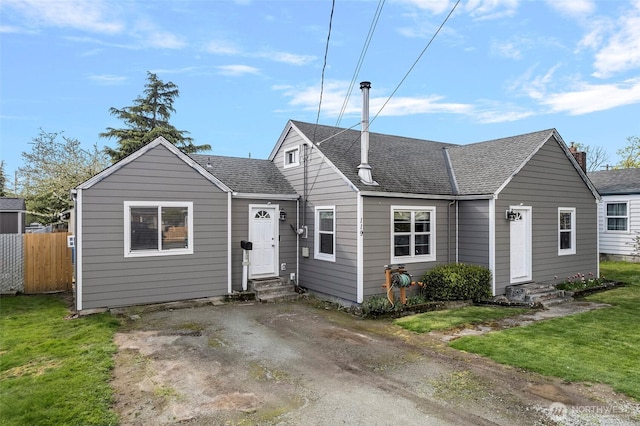 119 N Mckinley St, Burlington, WA 98233 - view of front of home with entry steps, roof with shingles, and fence