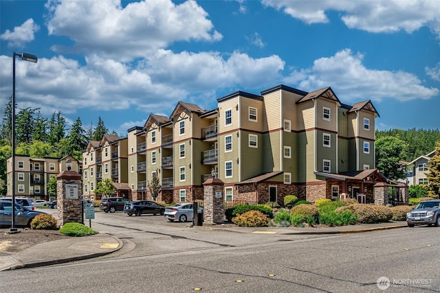 view of building exterior with a residential view