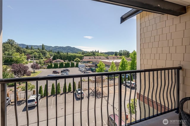 balcony featuring a mountain view
