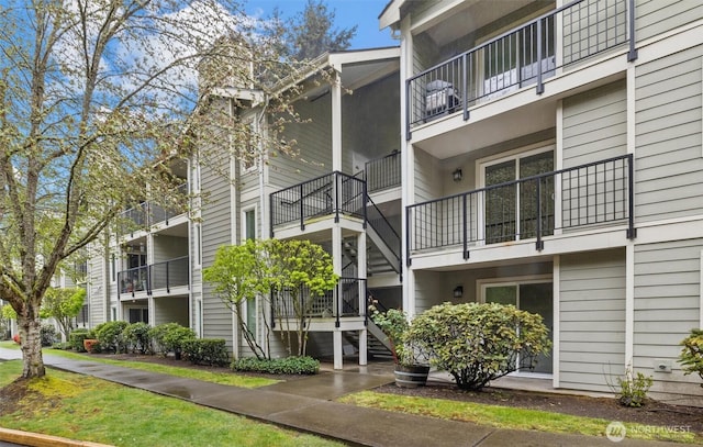 view of property featuring stairs